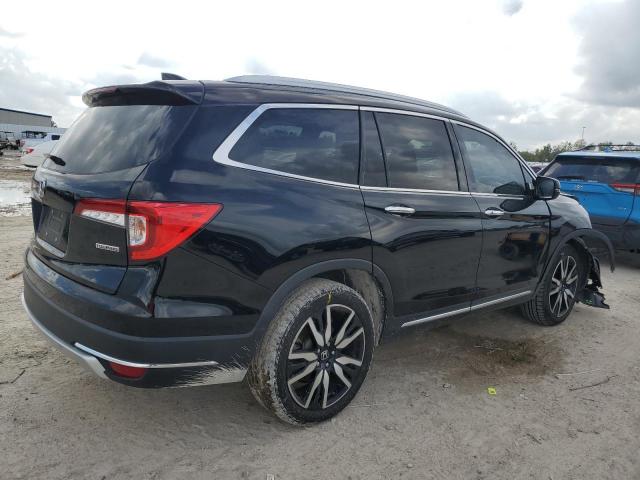 Photo 3 from auction – 2019 HONDA PILOT TOUR with VIN 5FNYF5H91KB030811