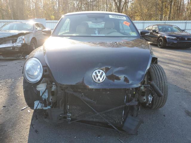 Photo 5 from auction – 2014 VOLKSWAGEN BEETLE with VIN 3VW517AT7EM819013