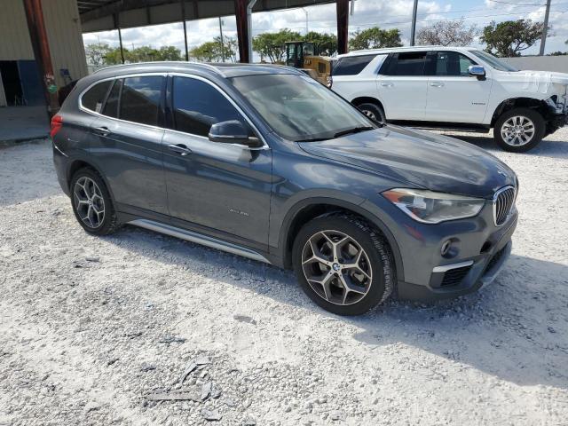 Photo 4 from auction – 2017 BMW X1 XDRIVE2 with VIN WBXHT3C39H5F68351