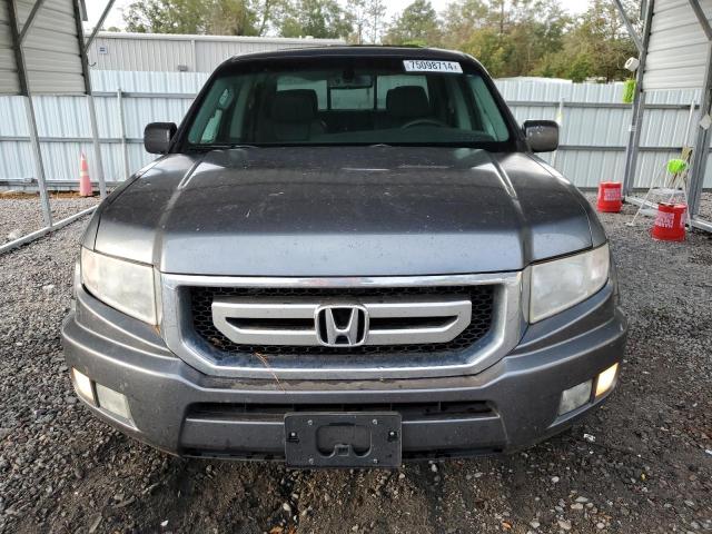 Photo 5 from auction – 2010 HONDA RIDGELINE with VIN 5FPYK1F58AB004801