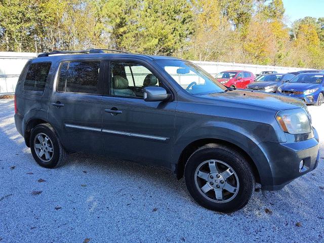 Photo 4 from auction – 2010 HONDA PILOT TOUR with VIN 5FNYF3H93AB018002