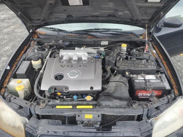 Photo 11 from auction – 2003 NISSAN MAXIMA GLE with VIN JN1DA31A83T420232
