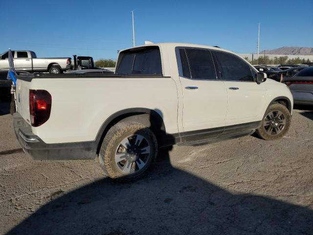 Photo 3 from auction – 2018 HONDA RIDGELINE with VIN 5FPYK3F77JB017343
