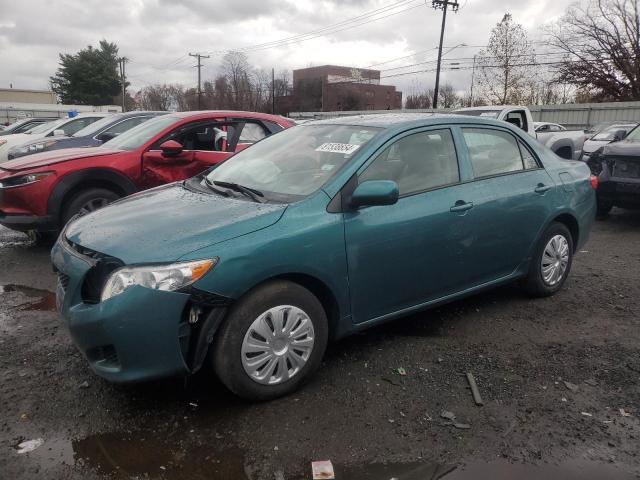 TOYOTA COROLLA 2010 with VIN 2T1BU4EE0AC495722 - Photo from auction