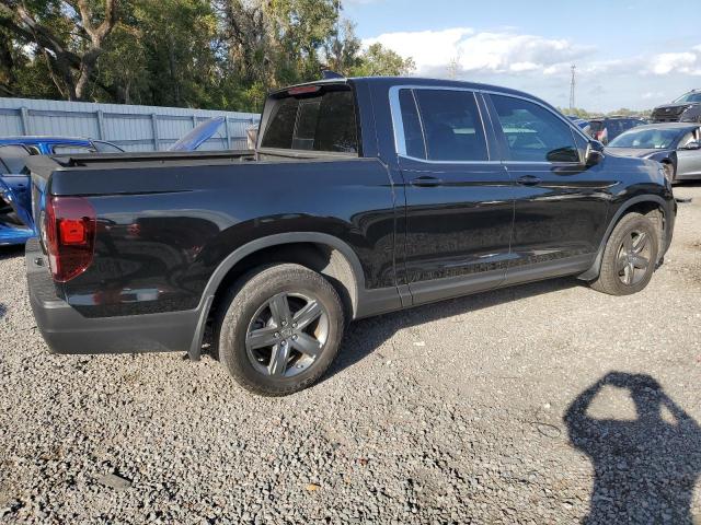 Photo 3 from auction – 2023 HONDA RIDGELINE with VIN 5FPYK3F56PB034013