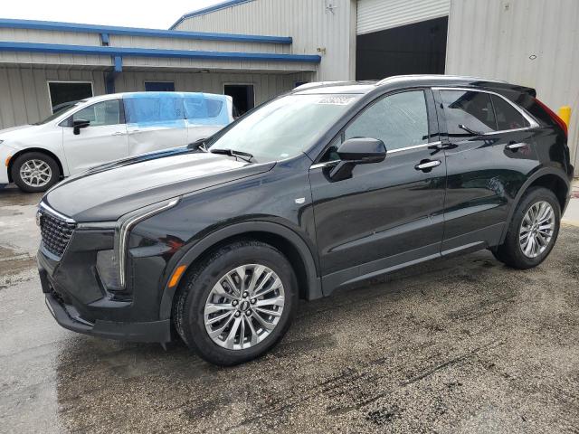 CADILLAC XT4 PREMIU 2024 with VIN 1GYFZDR41RF128216 - Photo from auction
