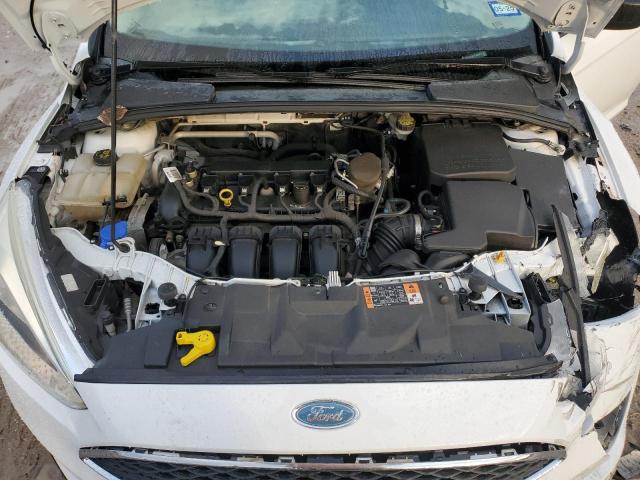 Photo 11 from auction – 2015 FORD FOCUS S with VIN 1FADP3E21FL350291