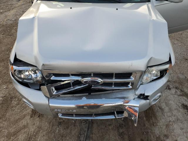 Photo 12 from auction – 2009 FORD ESCAPE LIM with VIN 1FMCU04G49KA57503