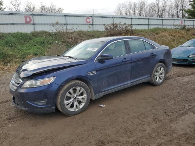 FORD TAURUS SEL 2011 with VIN 1FAHP2EWXBG158000 - Photo from auction
