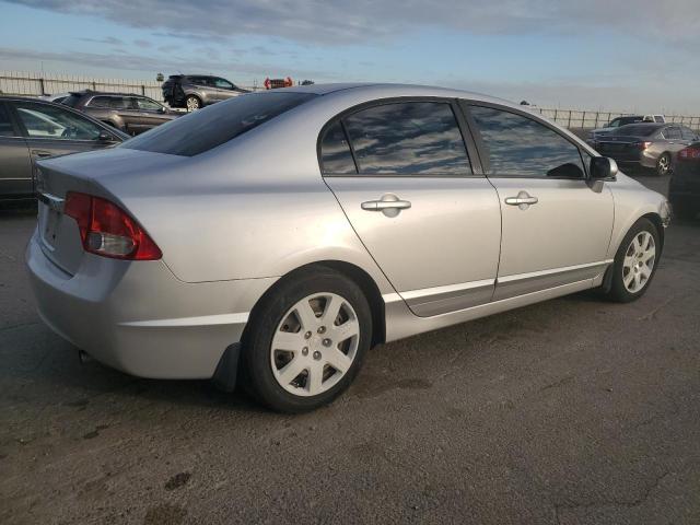 Photo 3 from auction – 2011 HONDA CIVIC LX with VIN 19XFA1F57BE046001