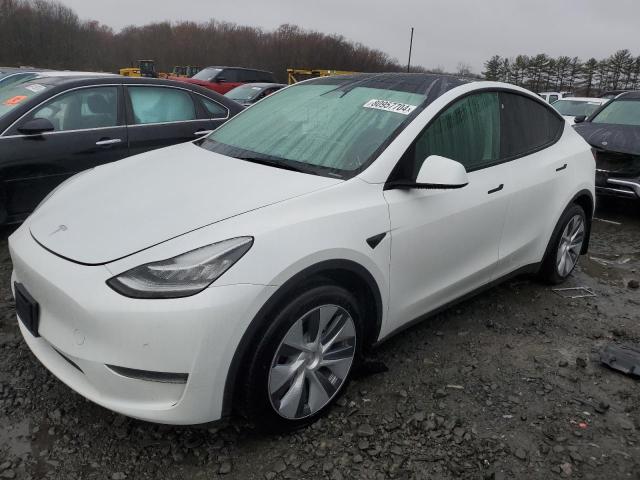 TESLA MODEL Y 2023 z numerem VIN 7SAYGDEEXPA077478 - Zdjęcie z aukcji