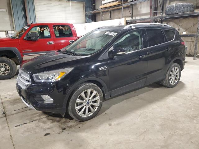 FORD ESCAPE TIT 2017 with VIN 1FMCU9J99HUD06097 - Photo from auction