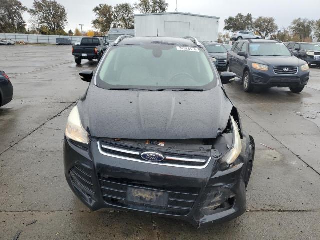 Photo 5 from auction – 2014 FORD ESCAPE TIT with VIN 1FMCU0J98EUD73992