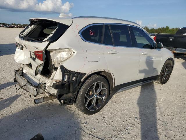 Photo 3 from auction – 2016 BMW X1 XDRIVE2 with VIN WBXHT3C3XGP889556