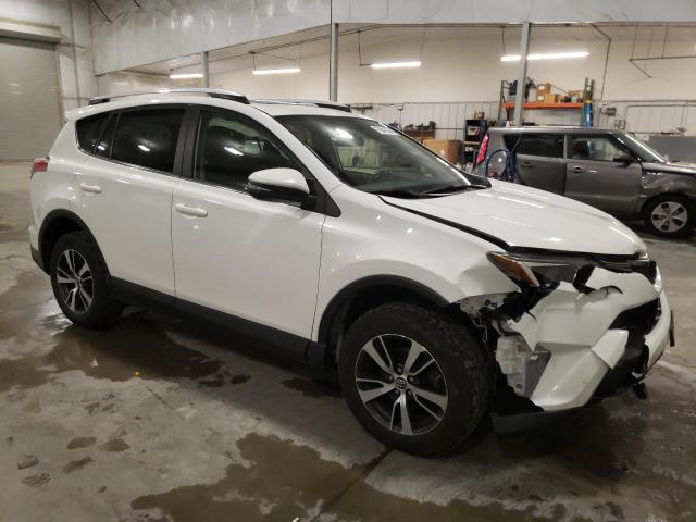 Photo 4 from auction – 2016 TOYOTA RAV4 XLE with VIN JTMRFREV8GJ101189