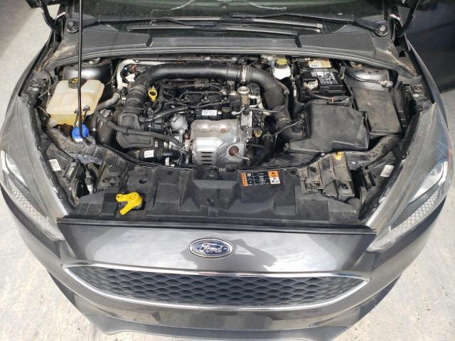 Снимка 11 от търг – 2018 FORD FOCUS SE с VIN 1FADP3FEXJL209978