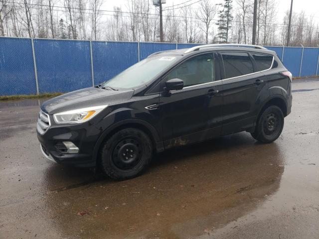 FORD ESCAPE TIT 2017 with VIN 1FMCU9J92HUD87766 - Photo from auction