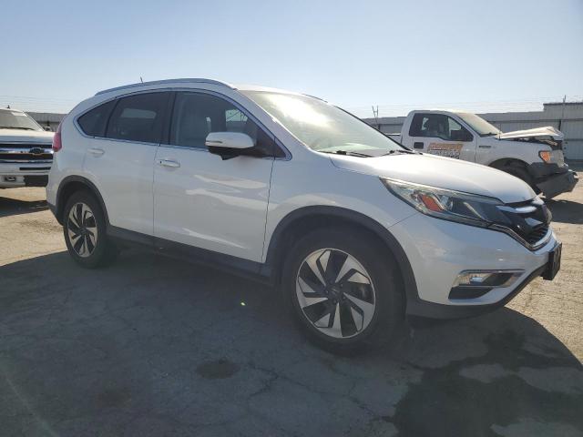 Photo 4 from auction – 2015 HONDA CR-V TOURI with VIN 5J6RM3H92FL006240