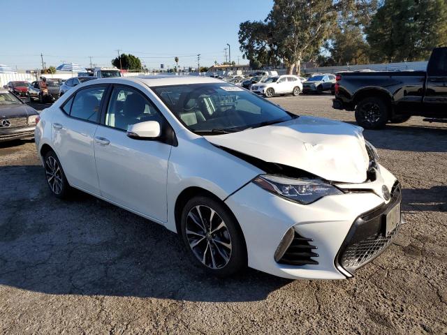 Photo 4 from auction – 2017 TOYOTA COROLLA L with VIN 5YFBURHE8HP596140