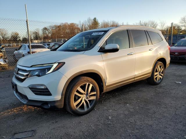 Photo 1 from auction – 2017 HONDA PILOT TOUR with VIN 5FNYF6H9XHB085904