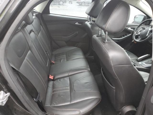 Photo 10 from auction – 2014 FORD FOCUS TITA with VIN 1FADP3J20EL162673