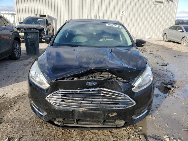 Photo 5 from auction – 2016 FORD FOCUS TITA with VIN 1FADP3N25GL302617