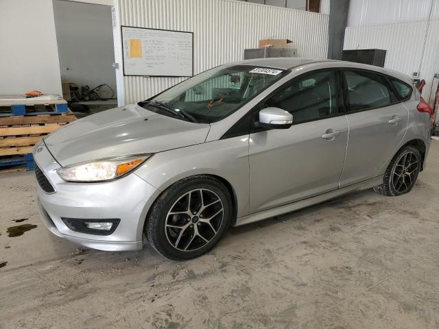 FORD FOCUS SE 2015 with VIN 1FADP3K23FL374757 - Photo from auction