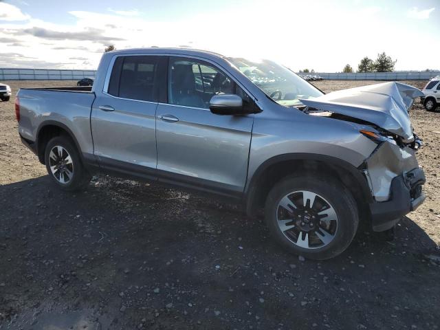 Photo 4 from auction – 2020 HONDA RIDGELINE with VIN 5FPYK3F55LB029475
