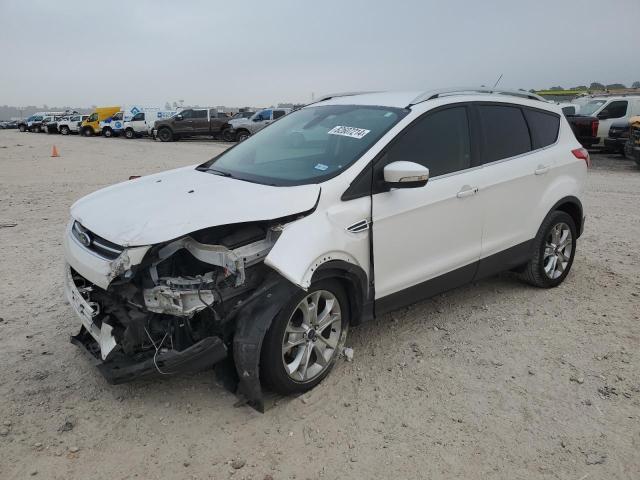 FORD ESCAPE TIT 2016 with VIN 1FMCU0JX8GUC66037 - Photo from auction