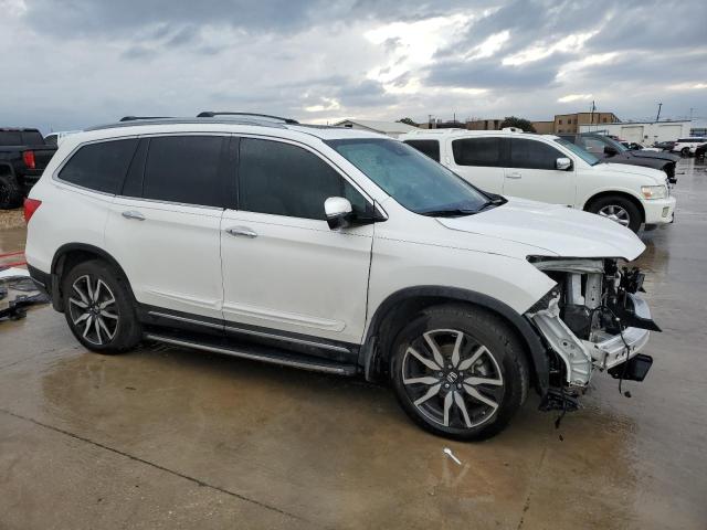 Photo 4 from auction – 2022 HONDA PILOT TOUR with VIN 5FNYF5H65NB028473