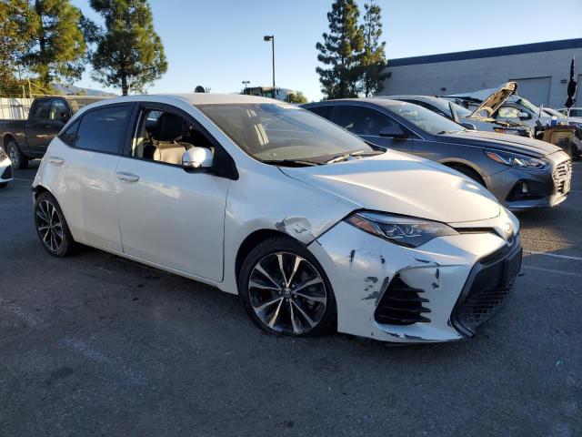 Photo 4 from auction – 2017 TOYOTA COROLLA L with VIN 5YFBURHE3HP592481