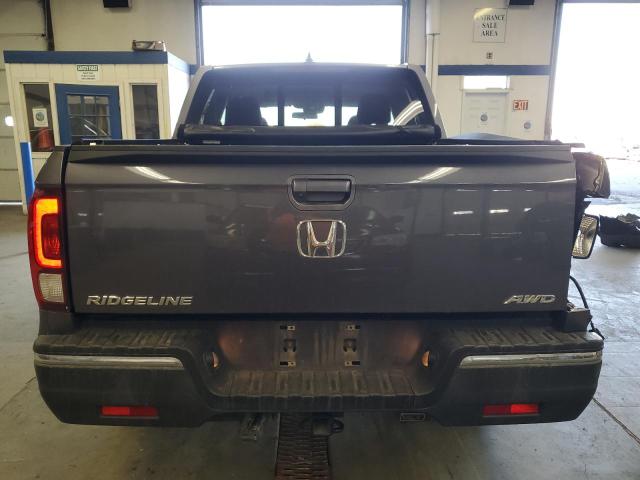 Photo 6 from auction – 2020 HONDA RIDGELINE with VIN 5FPYK3F56LB023491