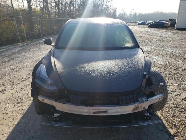 Photo 5 from auction – 2021 TESLA MODEL 3 with VIN 5YJ3E1EB7MF034989