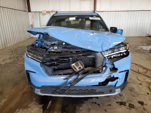Photo 5 from auction – 2024 HONDA PILOT TRAI with VIN 5FNYG1H60RB003556