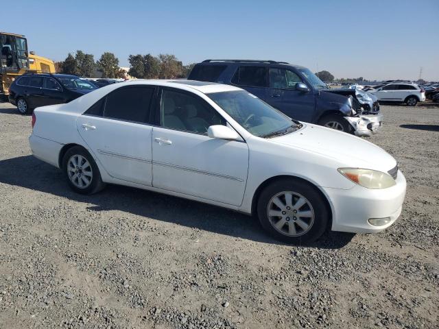 Photo 4 from auction – 2003 TOYOTA CAMRY LE with VIN 4T1BF30K13U036394