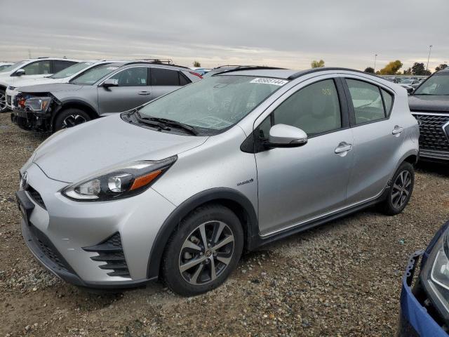 TOYOTA PRIUS C 2018 with VIN JTDKDTB30J1619344 - Photo from auction