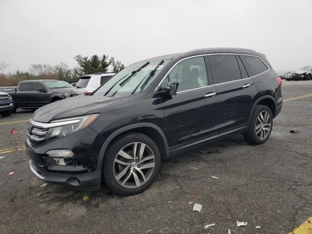 HONDA PILOT 2016 with VIN 5FNYF6H99GB088873 - Photo from auction