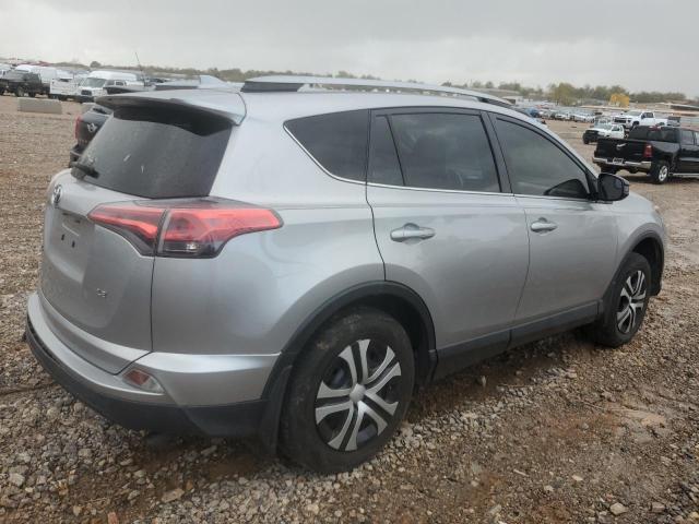 Photo 3 from auction – 2018 TOYOTA RAV4 with VIN JTMZFREV3JJ210909