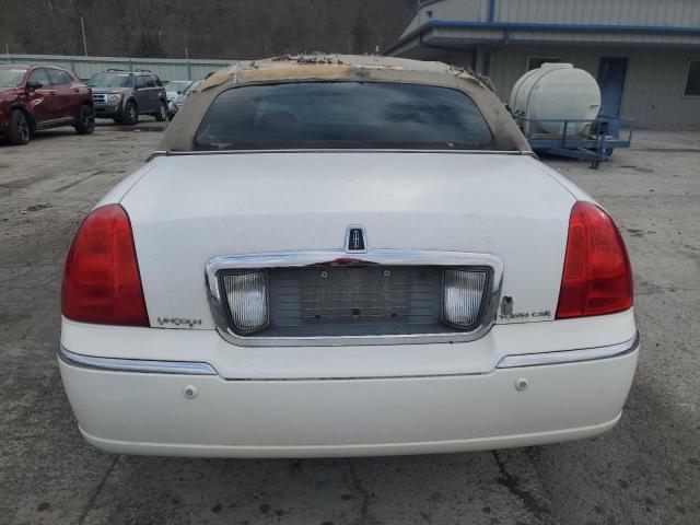 Photo 6 from auction – 2004 LINCOLN TOWN CAR E with VIN 1LNHM81W14Y619797