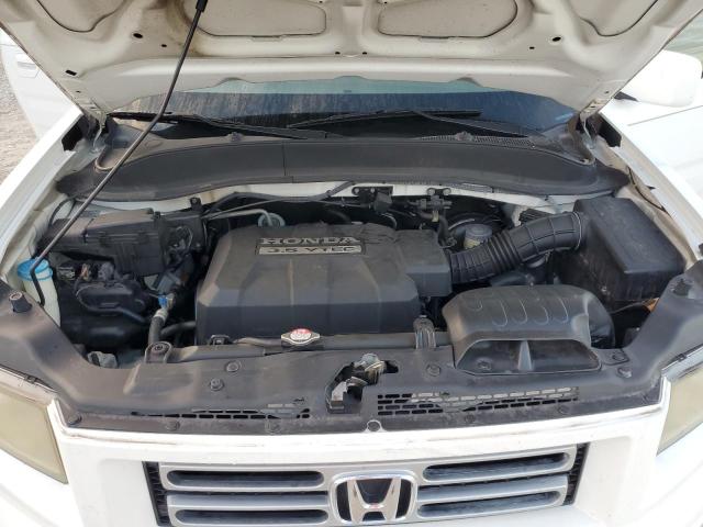 Photo 12 from auction – 2006 HONDA RIDGELINE with VIN 2HJYK165X6H572425