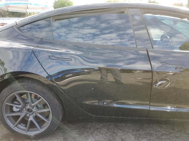Photo 10 from auction – 2021 TESLA MODEL 3 with VIN 5YJ3E1EB3MF852669