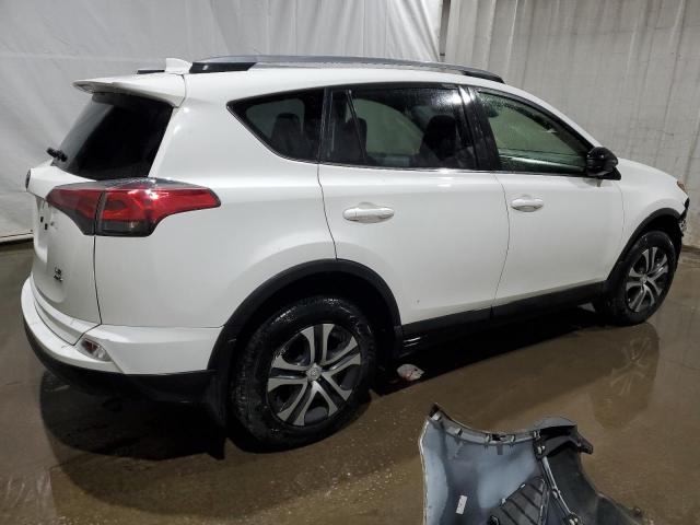 Photo 3 from auction – 2017 TOYOTA RAV4 LE with VIN JTMBFREV2HJ704948