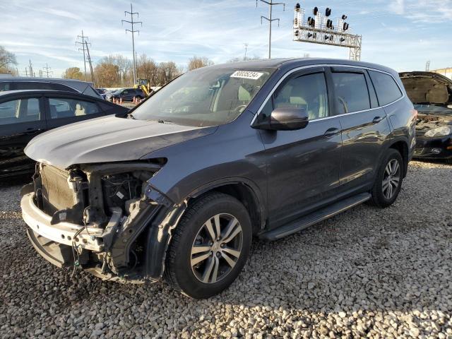 HONDA PILOT EXL 2018 with VIN 5FNYF6H66JB048697 - Photo from auction
