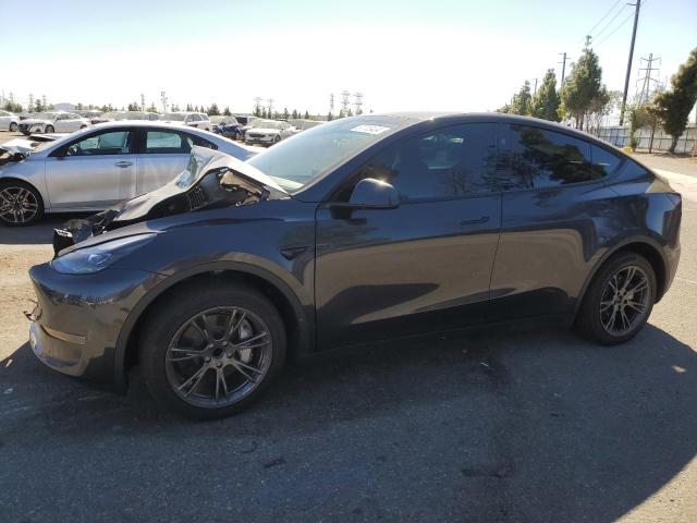 TESLA MODEL Y 2024 with VIN 7SAYGDEDXRF112890 - Photo from auction