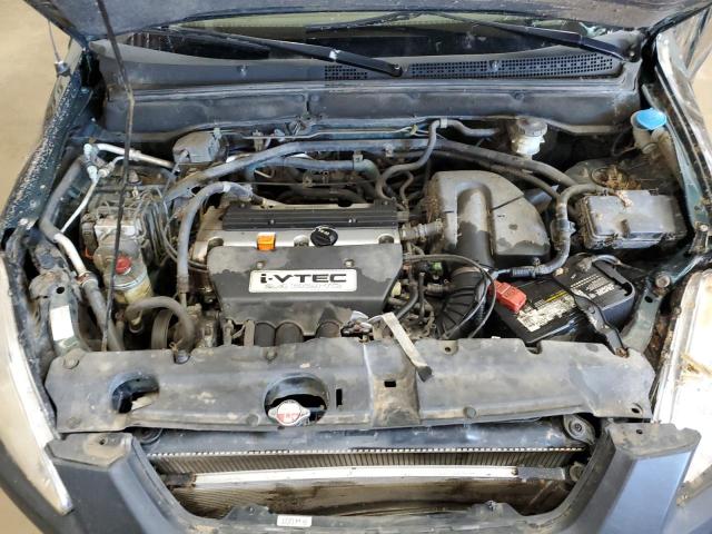 Photo 12 from auction – 2004 HONDA CR-V EX with VIN JHLRD78824C052249