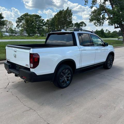 Photo 4 from auction – 2021 HONDA RIDGELINE with VIN 5FPYK3F10MB000674