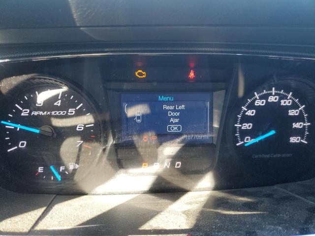 Photo 9 from auction – 2015 FORD TAURUS POL with VIN 1FAHP2MK7FG151672