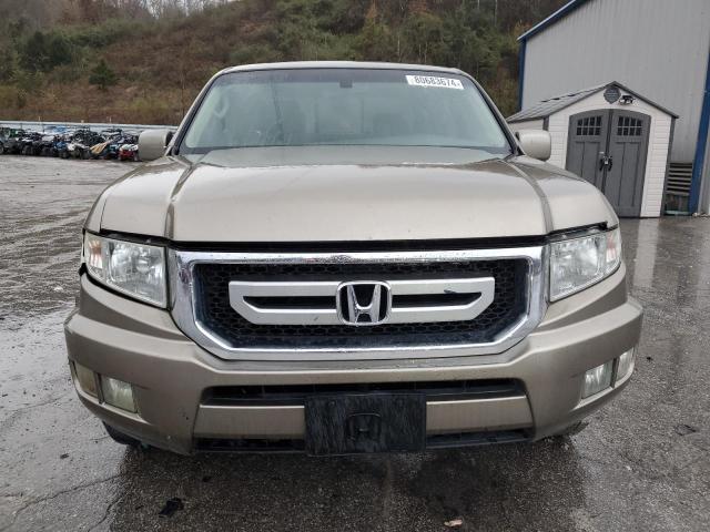 Photo 5 from auction – 2010 HONDA RIDGELINE with VIN 5FPYK1F52AB008522