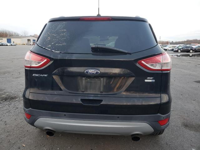 Photo 6 from auction – 2016 FORD ESCAPE SE with VIN 1FMCU9GX5GUC71451