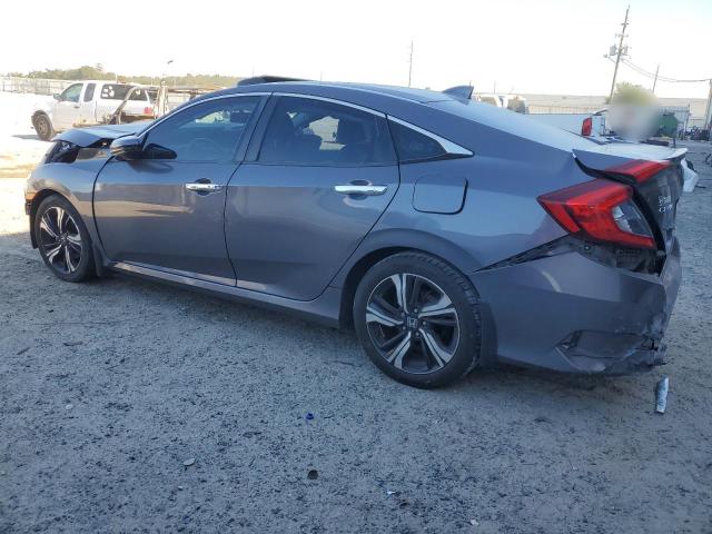 Photo 2 from auction – 2016 HONDA CIVIC TOUR with VIN 19XFC1F90GE034079